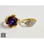 A 14ct single stone amethyst ring, claw set circular cut stone to reeded shoulders, weight 6.3g,