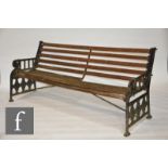 A pair of late 19th Century cast iron garden bench ends attributed to Coalbrookdale, after the '
