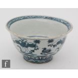A Chinese blue and white bowl, raised on a high footring, with slightly everted rim, the exterior