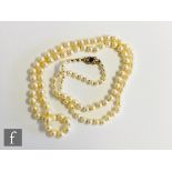 A single row of graduated cultured pearls, largest pearl 8mm diameter, length of row 80cm,