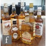 A collection of blended Scottish Whiskies and Bourbon, to include, The Famous Grouse, Lauder's,