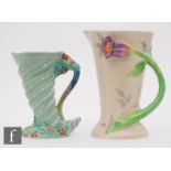 A Clarice Cliff Wilkinson Pottery jug decorated with a relief applied tulip, the stem running down