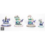 A group of four enamelled Indian chess pieces, each modelled as figures riding horseback and