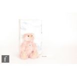 A 2009 Steiff Teddy Bear Replica 1925, chest tag and button in ear with white tag 408731, pink