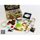 A small parcel lot of assorted silver, phenolic and other jewellery to include bangles, brooches,