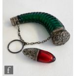 A 19th Century horn shaped green cut glass finger scent with white terminals, length 9cm, with a