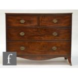A George IV mahogany chest of two short over two long drawers, raised to French bracket feet, S/D.
