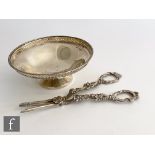 A pair of Early Victorian grape scissors with fruiting vine decoration with a small bon bon dish,