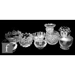 A collection of nine 18th Century and later glass table salts of plain and cut form, including one