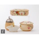 Four pieces of early 20th Century Royal Worcester blush ivory comprising a small trinket box and
