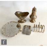 Five items of hallmarked silver, a small salver, a toast rack, a pedestal sugar bowl, a sugar castor