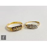 An early 20th Century 18ct diamond five stone boat shaped ring, with a 9ct example set of a twist,