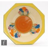 A Clarice Cliff octagonal fruit bowl decorated in the Crocus pattern, printed Bizarre Newport