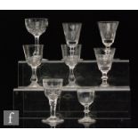 A collection of various 19th Century drinking glasses to include bucket bowl examples, mostly with