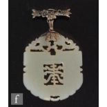 A Chinese jade carved pendant, Qing Dynasty (1664-1911), the pale green stone, with slight russet