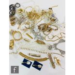 A parcel lot of assorted costume jewellery to include crystal beads, earrings, chains etc.