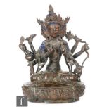 A Sino-Tibetan figure of the four-armed Avalokiteshvara Chenrezig, the revered Bodhisattva, cast
