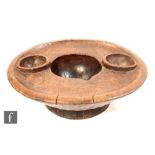 A 19th Century tribal circular mixing or grinding bowl, waisted pedestal form possibly of Indian