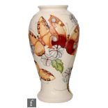 A large Moorcroft Pottery vase of inverted baluster form decorated in the Butterfly pattern designed
