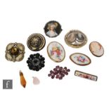 Ten assorted brooches to include a 9ct mounted rectangular floral example, Victorian and later