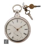 A George III hallmarked silver pair cased verge pocket watch, Roman numerals to a white enamelled