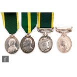 An Edward VII territorial Efficiency Medal to Sjt H.A Pert 6/Hants Reg with a George V example to