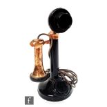 An early 20th Century black painted candlestick telephone No 156, AK13/235, height 30cm.