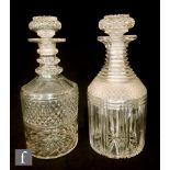 A late Georgian crystal mallet form spirit decanter with mitre cut body below cut bands of