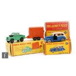 A collection of five Dublo Dinky diecast models, comprising 064 Austin Lorry in green with grey
