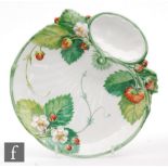 A late 19th Century Minton strawberry dish of fluted shell form relief moulded with flowering and