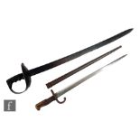 A late 19th century officers cavalry sword, iron grip and hilt, 73cm blade and a socket bayonet