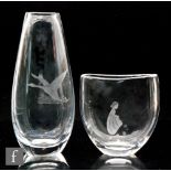 Two post war Swedish glass vases, an Orrefors vase of compressed ovoid vase designed by Sven