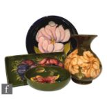 A small collection of post war Walter Moorcroft to comprise a rectangular pen tray in Anemone on