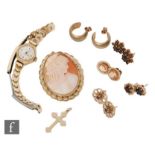 Five pairs of 9ct stud and hoop earrings, with a 9ct cross, a 9ct cameo brooch and a lady's