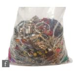 A large parcel lot of assorted modern costume jewellery to include beads, bangles, bracelets,