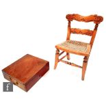 A child's miniature carved beech chair on turned legs, together with a two handled box fitted with a