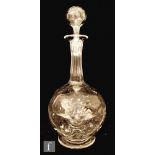 An early 20th Century Thomas Webb & Son decanter of footed spherical form, optic moulded in a