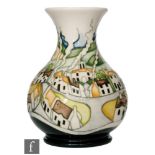 A Moorcroft Pottery vase decorated in the Sneem pattern designed by Paul Hilditch with a tubelined