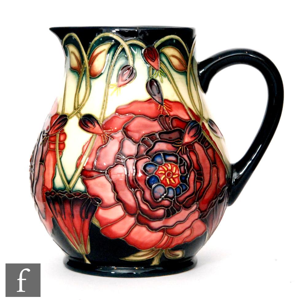 A Moorcroft Pottery Connoisseur Collection jug decorated in the Eustoma pattern designed by Carole