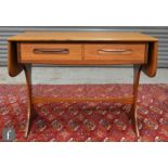 A G plan teak sofa table fitted with two drawers on shaped ends united by a rail stretcher, height