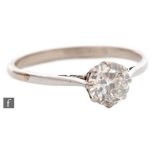 An 18ct white gold diamond solitaire ring, old cut claw set stones, weight approximately 0.80ct,