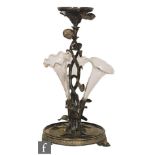 An early 20th Century silver plated epergne modelled as a lily plant to a circular base supporting