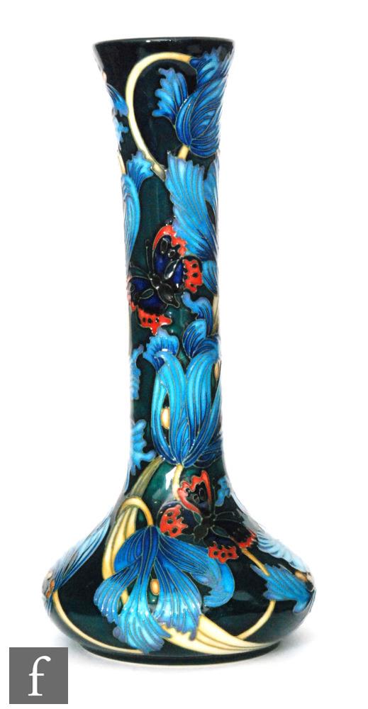 A large Moorcroft Pottery Design Trial vase of compressed form with a tall cylinder neck decorated