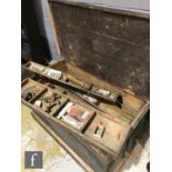 A pine tool chest with fitted tray interior and carpentry tools and a similar portable wooden tool