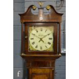 A 19th Century mahogany longcase clock, the 30 hour striking movement enclosed by a pillar glazed