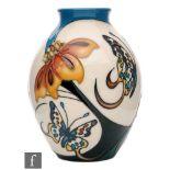 A Moorcroft Pottery vase of ovoid form with collar neck, decorated in the Butterfly Collection after