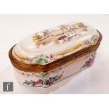 A 19th Century Bilston enamel elongated oval box, the hinged box decorated with two figures and a