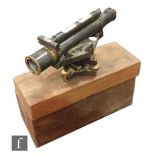 An early 20th Century brass laquered theodolite, the base fitted with a silvered compass by