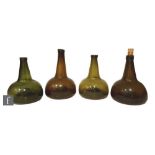 A group of four Dutch onion bottles, each with an applied lip, two in olive green and two in lighter