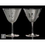 A pair of early 20th Century cocktail glasses by James Powell & Sons, each with conical bowl above